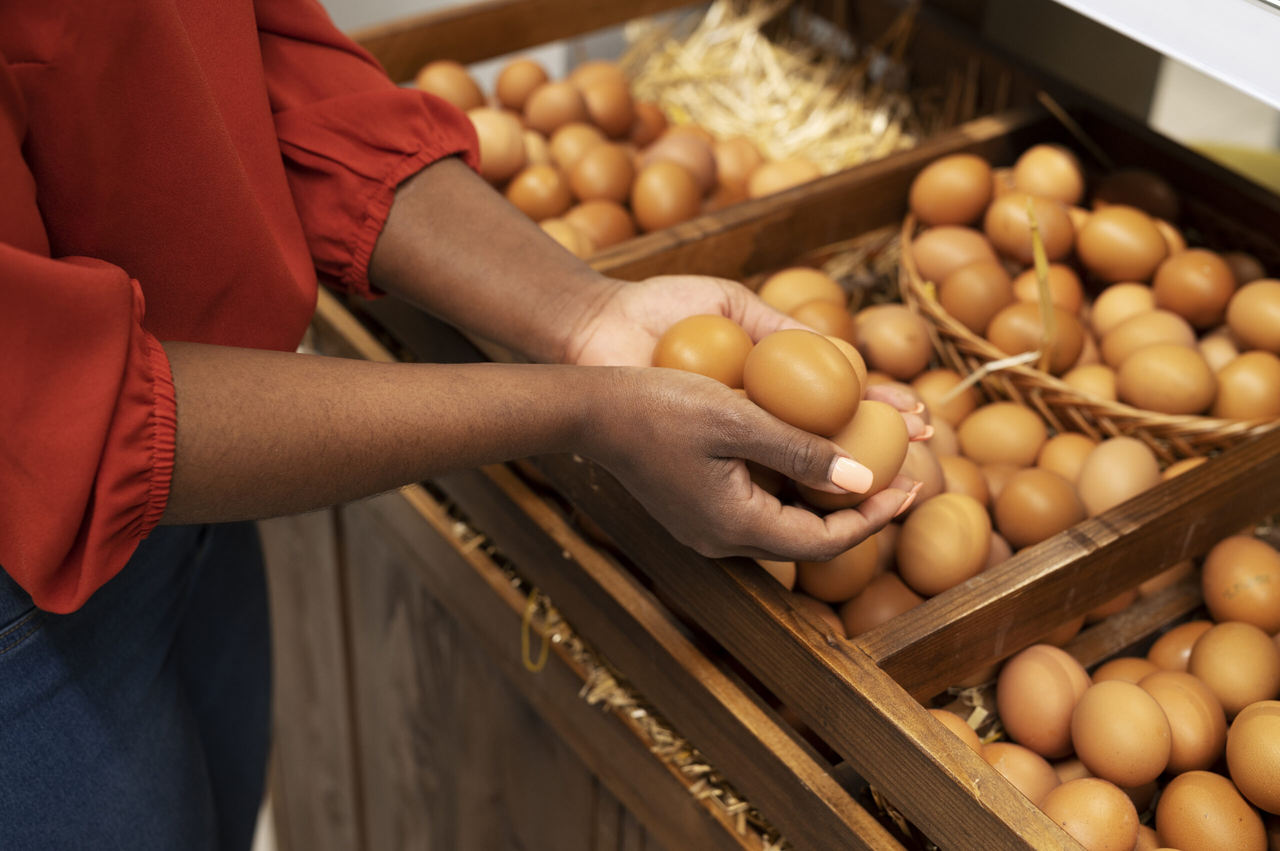 woman-getting-eggs-supermarket